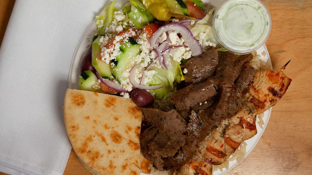 #17. Zorbas Platter · Served with greek salad rice pita and tzatziki sauce.