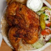 #18. Chicken Platter · Served with greek salad rice pita and tzatziki sauce.