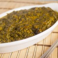 Saag Paneer · Veggie. Fresh spinach & paneer cooked with fresh cilantro, tomatoes and Indian spices in a c...