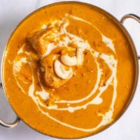 Chicken Tikka Masala · Chicken cooked with tomato, onion, bell pepper and butter sauce.