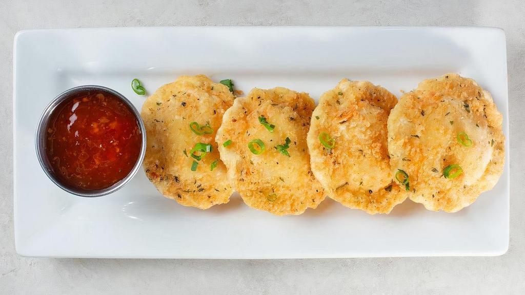 Fried Ravioli · Cheese raviolis lightly breaded with Italian seasoning and bread crumbs.. Served with sweet chili dipping sauce.