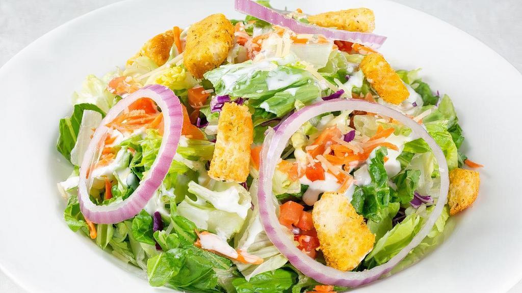 House Salad · Fresh romaine and iceberg lettuce with red cabbage, carrots, red onions, tomatoes, Parmesan cheese and garlic croutons.