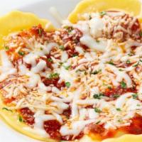 Classic Cheese Ravioli · Large ravioli stuffed with a blend of creamy Italian cheeses. Served with your choice of sau...