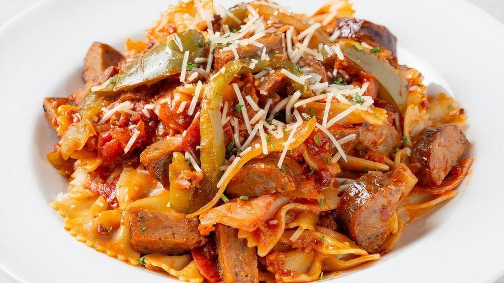Five Meat Tuscan Pasta  · Bowtie pasta, meat sauce, Italian sausage, bacon, ham, pepperoni, freshly sautéed onions and green bell peppers.