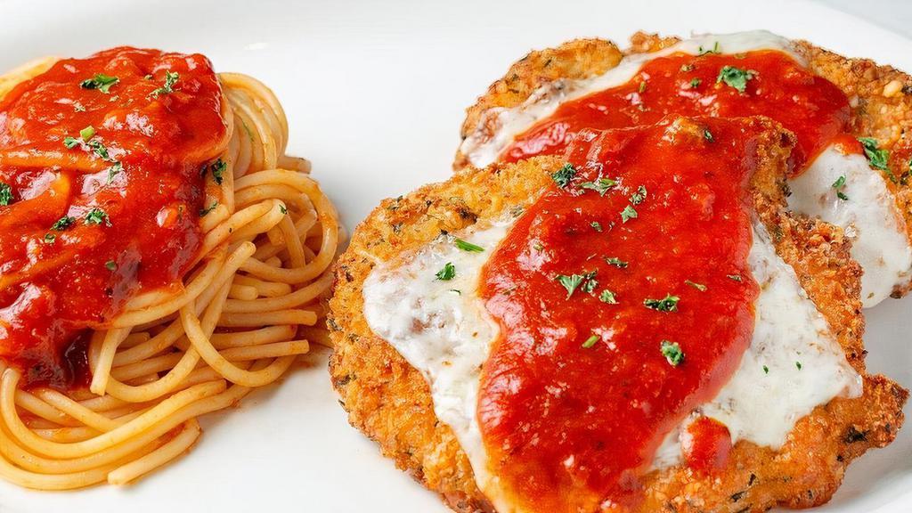 Handmade Parmesan · Our signature recipe. Served with spaghetti and tomato sauce.. Classic Chicken or Grilled Chicken topped with tomato sauce, Parmesan and Mozzarella.. Eggplant topped with spicy marinara sauce, Parmesan and Mozzarella. .