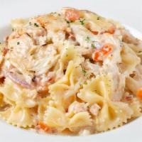 Grilled Chicken Bowtie Festival · Bowtie sautéed with sliced chicken, bacon, garlic, red onions, Roma tomatoes and Asiago crea...