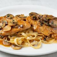 Chicken Marsala · Sautéed chicken breast with mushrooms and sweet wine sauce. Served with your choice of fettu...