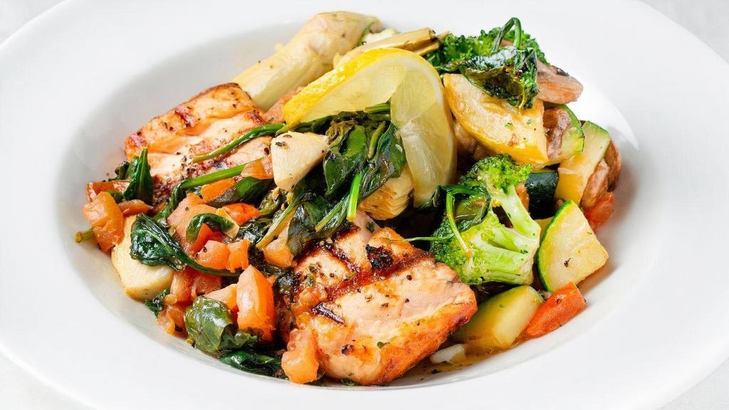 Lemon Pepper Salmon* · Marinated in Italian herbs, topped with sautéed artichoke hearts, Roma tomatoes, spinach and a wine lemon butter sauce, with fresh vegetables.
