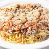 Chicken Scaloppini Family Platter · Sautéed chicken breasts, mushrooms, Roma tomatoes, bacon and lemon butter cream sauce. Serve...