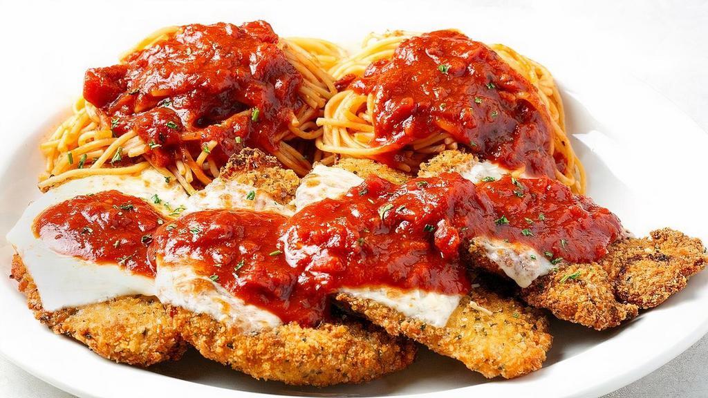 Handmade Parmesan Family Platter · Our signature recipe. Served with spaghetti and tomato sauce. Classic Chicken or Grilled Chicken topped with tomato sauce, Parmesan and Mozzarella..