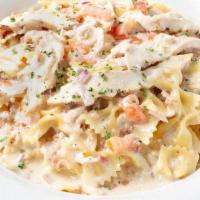 Grilled Chicken Bowtie Festival Family Platter · Bowtie sautéed with sliced chicken, bacon, garlic, red onions, Roma tomatoes and Asiago crea...