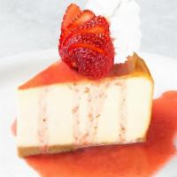 Strawberry Cheesecake · Creamy, smooth vanilla New York cheesecake served with strawberry sauce and topped with whip...