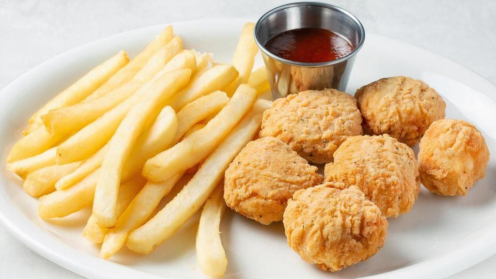 Chicken Nuggets With Fries · Breaded chicken nuggets served with fries and a side of BBQ Sauce.