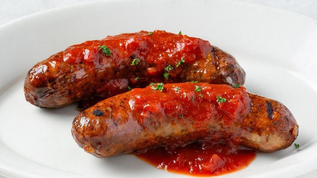 Add Italian Sausage · Two Italian sausage links slow cooked and served with our signature tomato sauce.