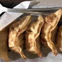 Pot Sticker · Deep fried ground chicken and vegetables wrapped in sealed dough, served with sweet and sour...