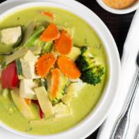 Spicy Green · Green curry in coconut milk with bamboo shoots, bell pepper and basil.