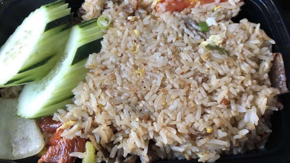 Crab Or Duck Fried Rice · Choice of crab or duck with egg, onion, green onion, and sliced cucumbers.
