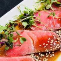 Tuna (6 Pcs.) · With scallions, jalapeños, garlic ponzu sauce.