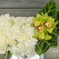 Au Naturale · A dozen white Roses, Hydrangeas, and cymbidium orchids.