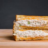 Albacore Tuna Melt · Grilled sourdough with freshly made albacore tuna mix and melted cheddar cheese.