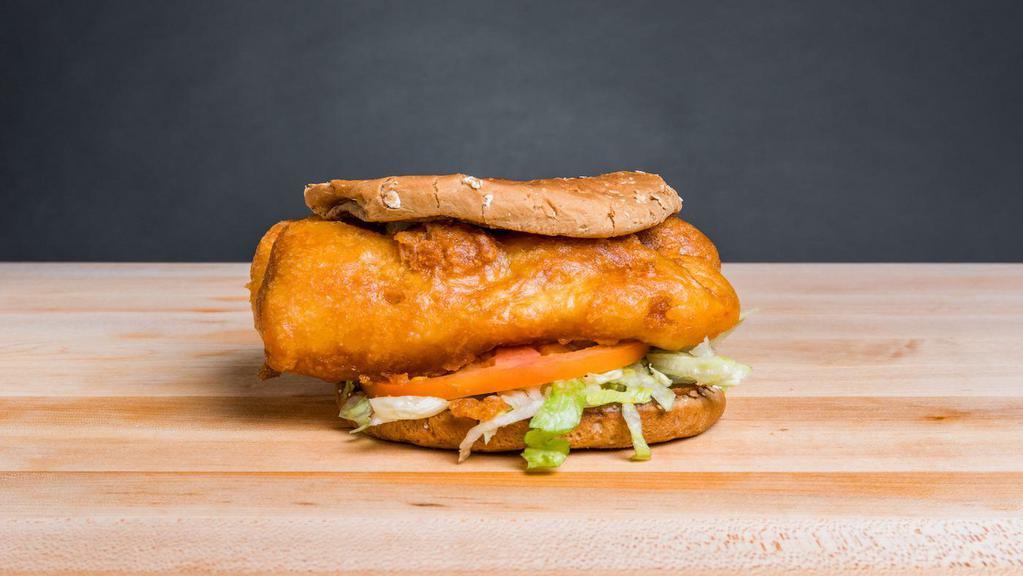 Battered Cod Sandwich · Whole wheat bun with wild-caught cod that’s battered and fried till golden brown with lettuce, tomato, and tartar sauce.