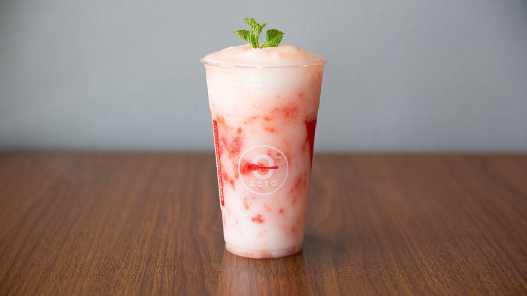 Pink Lychee · Strawberry lychee slush with fresh strawberry.