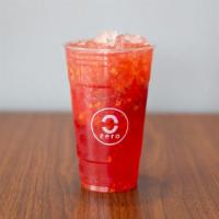 Strawberry Bliss · Strawberry peach green tea with fresh strawberry, peach, and chia seed.