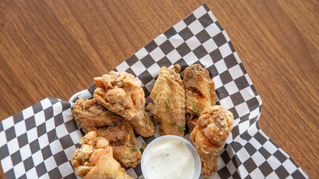 Crispy Chicken Wings · 6 pieces. Crispy chicken wings coated with house sauce.