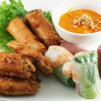 Khai Vị Bốn Mùa - Bon Mua Sampler · 1 - fresh spring roll, 1 - pork spring roll, 2 - egg rolls, 4 - garlic chicken wings.