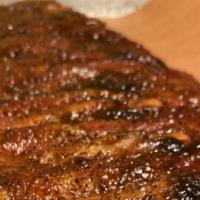 Pork Spare Ribs · Our Pork Spare Ribs are smoked to perfection. We smoke our ribs low-n-slow for four hours wi...