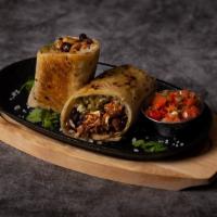 Pollo Burrito · Chicken burrito with rice, beans, and pico de gallo wrapped in a flour tortilla and crisped ...