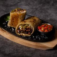 Pastor Burrito · Al pastor burrito with rice, beans, and pico de gallo wrapped in a flour tortilla and crispe...