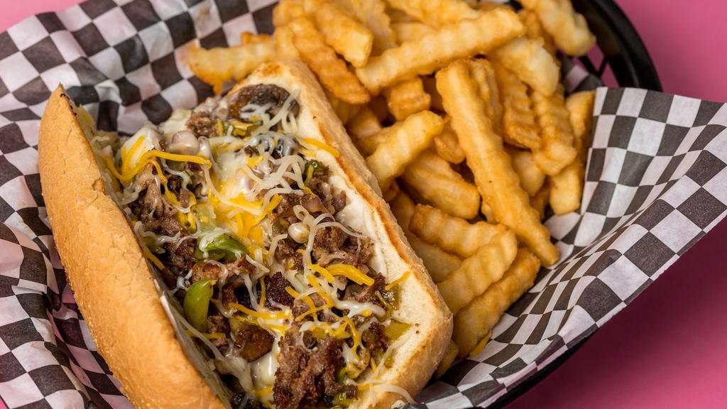 Philly Cheese Steak Sandwich · Hot Philly cheese steak(swiss) sandwich on toasted hoagie, with peppers and onions and mayonnaise