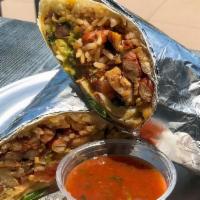 The Pepperdine Burrito · Chicken or steak, rice, beans, guacamole, pico de gallo, and cheese.