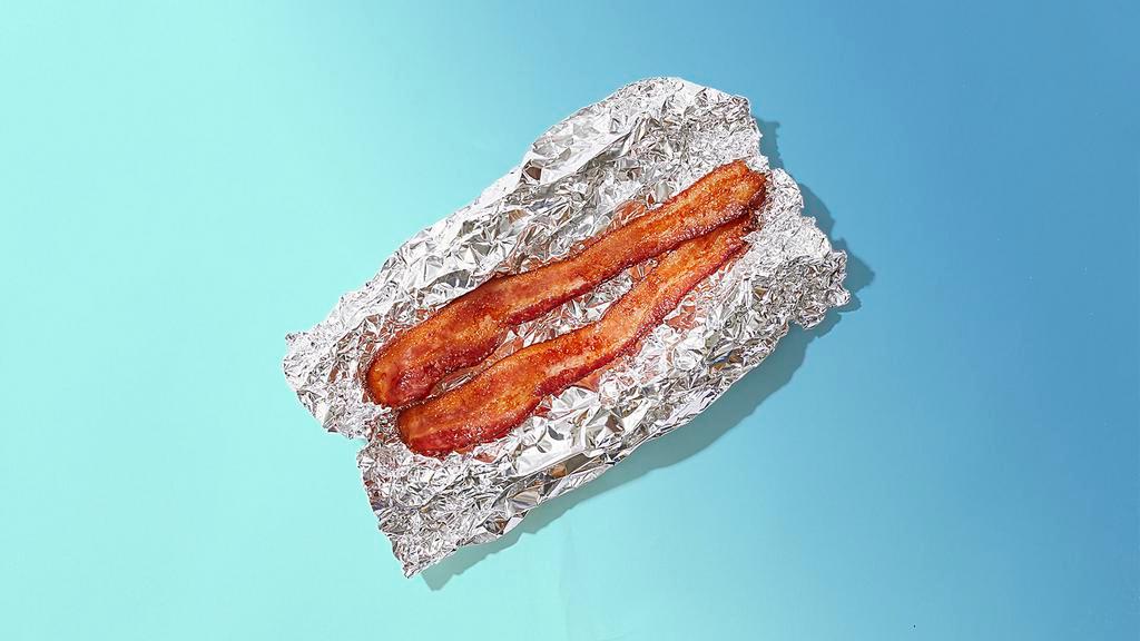 Side Bacon · 2 pieces of delish bacon.