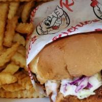 Chicken Sandwich · Chicken tender sandwich w/ slaw, pickles + secret sauce & fries.