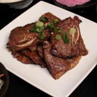 Rancho Galbi Dinner · Beef bone-in short rib with a traditional Korean marinade, served with rice and Korean side ...