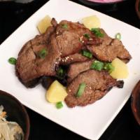 Hawaiian Galbi Dinner · Beef boneless short ribs with a sweet Hawaiian marinade, served with rice and Korean side di...