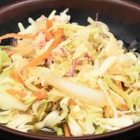Wasabi Salad · Cabbage salad topped with house made wasabi dressing.