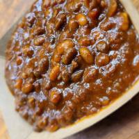 Bean Crack · So good you'll be hooked. Navy beans smoked in pork stock and bbq sauce, with chopped onions...