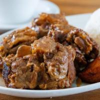 #14 Rabo Encendido (Oxtail Stew) · A creole based oxtail stew with a sharp peppery taste cooked with traditional cuban herbs an...