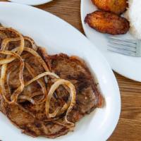 #10 Bistec De Palomilla (Top Sirloin Steak) · Grilled marinated sirloin, thinly sliced and topped with grilled onions.
