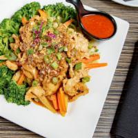Pad Kra Tiem · Gluten free.Stir-fried choice of protein in a garlic pepper sauce served over steamed mixed ...
