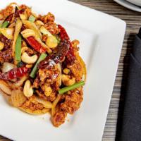 Pad Med Mamuang · Stir-fried breaded choice of protein or mixed veggies with cashew nuts, water chestnuts, oni...