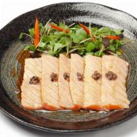 Seared Salmon Truffle Carpacio · Seared salmon (8 pieces), chopped truffle, ponzu sauce, white truffle oil