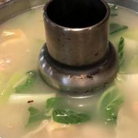Wonton Soup · Chicken, vegetable, and wonton stuffed with ground pork, in savory broth soup.