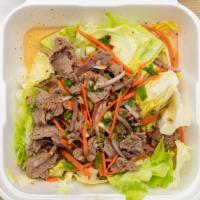 Beef Salad · Beef and lettuce, onion, carrot tossed in spicy lime dressing.