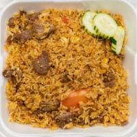 Fried Rice · Choice of pork, beef, chicken fried rice with egg, tomato.
