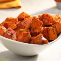 Roasted Spiced Sweet Potatoes · Roasted sweet potatoes tossed with our special BBQ seasoning blend.