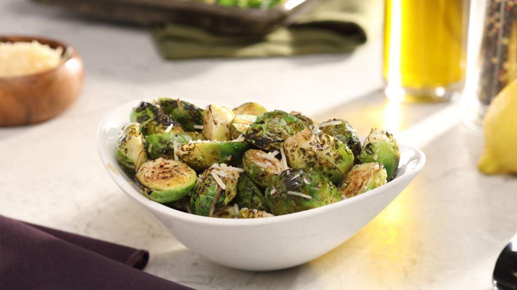 Crispy Brussels Sprouts With Parmesan · Roasted Brussels sprouts tossed with salt, pepper, lemon and parmesan.